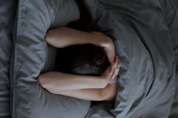 Woman upset that she can't get back to sleep